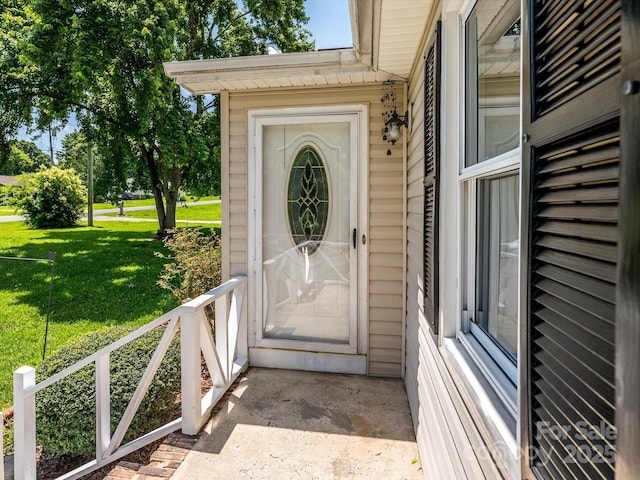 618 Springfield Dr NW, Concord, NC 28027 - property entrance with a yard