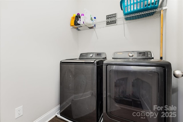 3332 Katherine Taylor Ct, Monroe, NC 28110 - washroom with washing machine and dryer and wood finished floors