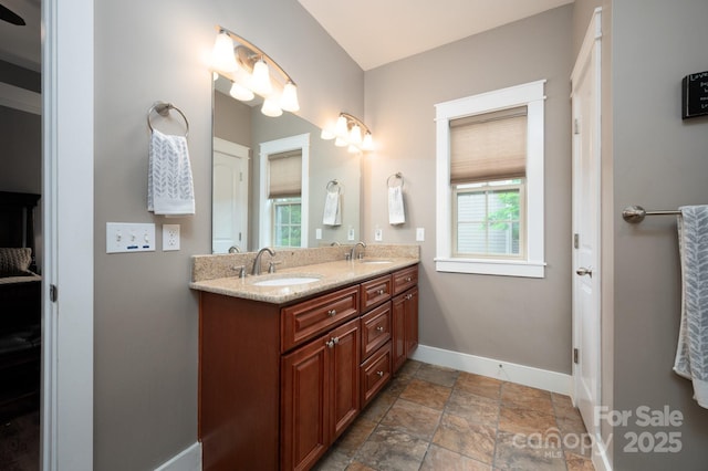 59 Ledgestone Dr, Fairview, NC 28730 - bathroom featuring double vanity and stone finish flooring