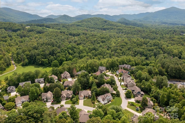 59 Ledgestone Dr, Fairview, NC 28730 - aerial perspective of suburban area with a forest and mountains