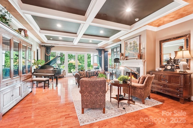 229 N Church St Unit 401, Charlotte, NC 28202 - living area featuring light wood-style floors, a premium fireplace, beam ceiling, coffered ceiling, and ornamental molding
