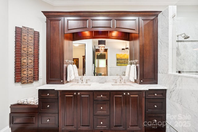 229 N Church St Unit 401, Charlotte, NC 28202 - bathroom featuring double vanity and crown molding