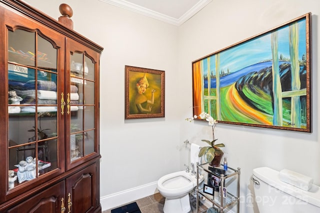 229 N Church St Unit 401, Charlotte, NC 28202 - bathroom featuring crown molding, a bidet, and tile patterned flooring