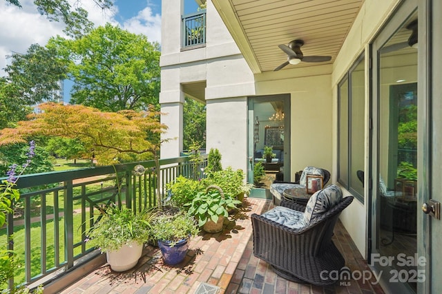 229 N Church St Unit 401, Charlotte, NC 28202 - balcony with ceiling fan