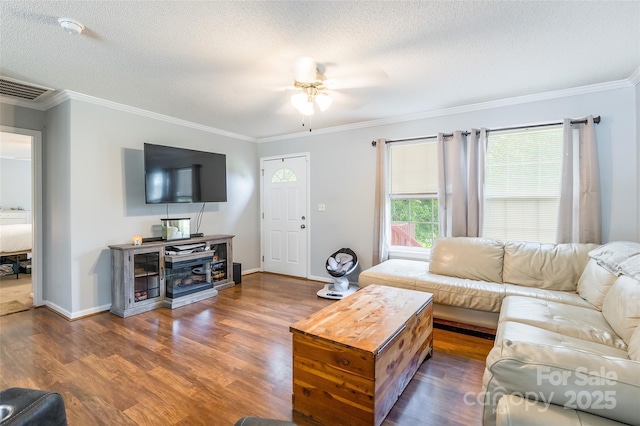 1828 Pine Hollow Pl, Hudson, NC 28638 - living area featuring a ceiling fan, wood finished floors, ornamental molding, and a textured ceiling
