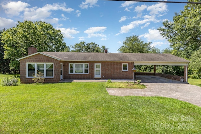 416 Pete Brittain Rd, Morganton, NC 28655 - ranch-style house featuring a chimney, brick siding, concrete driveway, and a front lawn