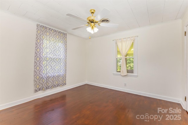 416 Pete Brittain Rd, Morganton, NC 28655 - unfurnished room with dark wood finished floors, ceiling fan, and ornamental molding