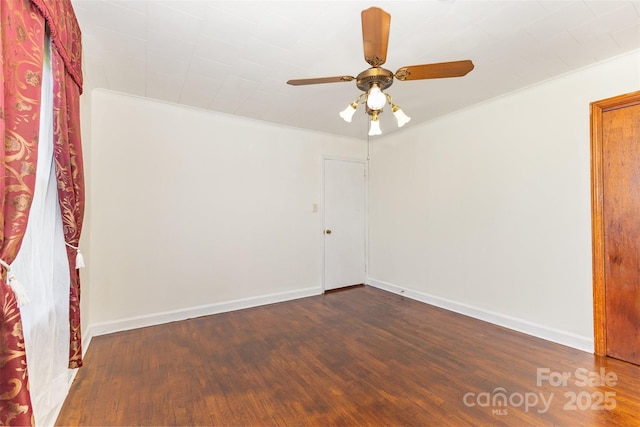 416 Pete Brittain Rd, Morganton, NC 28655 - unfurnished room featuring dark wood-style flooring, crown molding, and ceiling fan