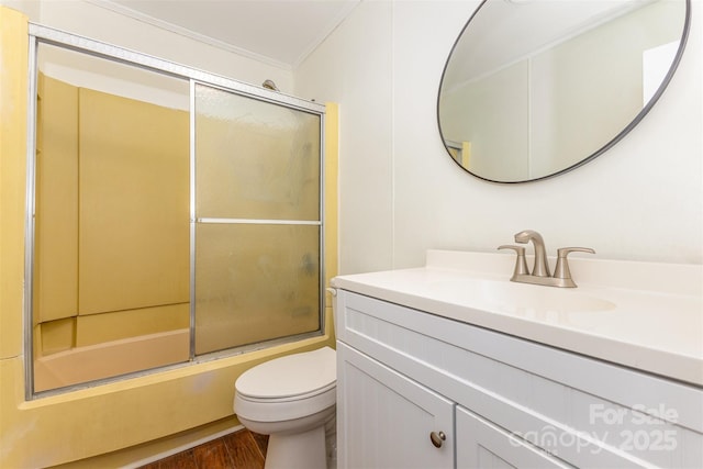 416 Pete Brittain Rd, Morganton, NC 28655 - bathroom with crown molding, vanity, shower / bath combination with glass door, and wood finished floors