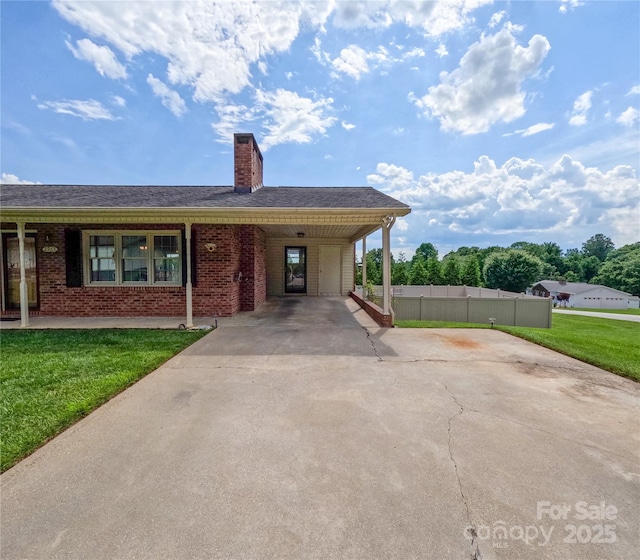 2963 Freezer Locker Rd, Hudson, NC 28638 - view of front of property with driveway, brick siding, a chimney, and an attached carport