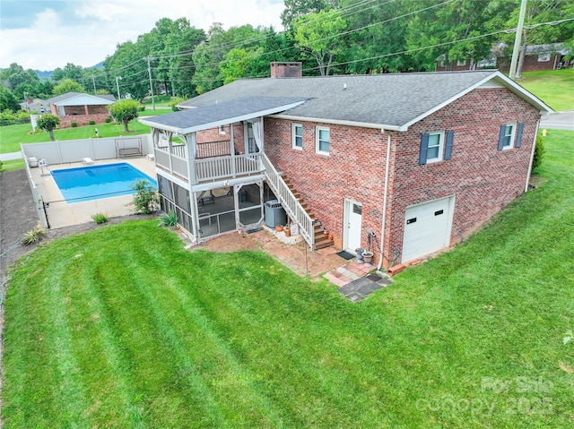 2963 Freezer Locker Rd, Hudson, NC 28638 - back of house with brick siding, a garage, a chimney, a shingled roof, and stairs