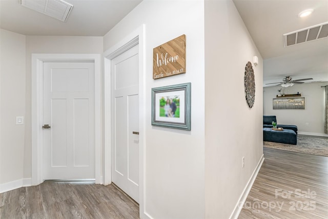 4227 Mackinnon Dr, Charlotte, NC 28214 - hall with wood finished floors and baseboards