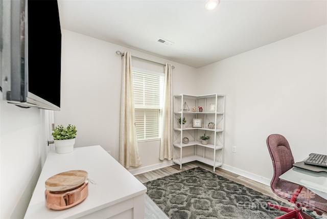 4227 Mackinnon Dr, Charlotte, NC 28214 - office space with light wood-style flooring and baseboards