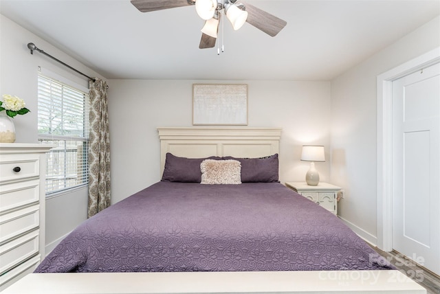 4227 Mackinnon Dr, Charlotte, NC 28214 - bedroom featuring a ceiling fan and baseboards