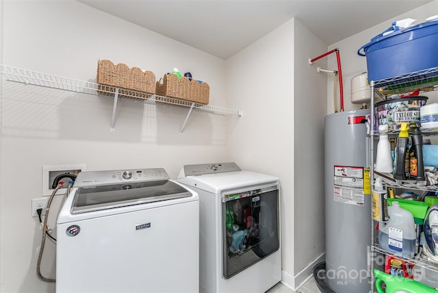 4227 Mackinnon Dr, Charlotte, NC 28214 - laundry area with electric water heater and independent washer and dryer