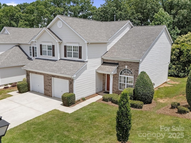 12415 Stratfield Place Cir, Pineville, NC 28134 - traditional home featuring brick siding, a shingled roof, an attached garage, and concrete driveway