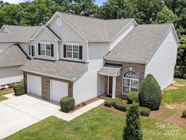 12415 Stratfield Place Cir, Pineville, NC 28134 - traditional home with brick siding, a shingled roof, concrete driveway, and an attached garage