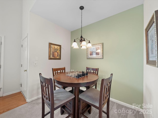 12415 Stratfield Place Cir, Pineville, NC 28134 - dining area with a chandelier and light colored carpet