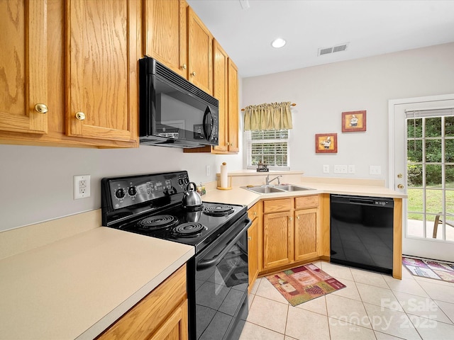 12415 Stratfield Place Cir, Pineville, NC 28134 - kitchen featuring black appliances, light tile patterned floors, light countertops, and recessed lighting