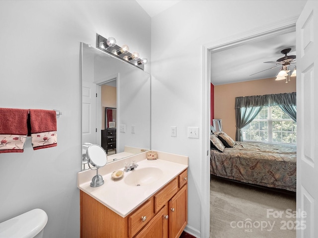12415 Stratfield Place Cir, Pineville, NC 28134 - bathroom with vanity, connected bathroom, and ceiling fan