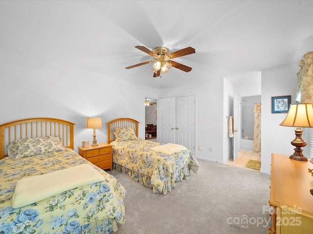 12415 Stratfield Place Cir, Pineville, NC 28134 - carpeted bedroom with a closet, ceiling fan, and ensuite bathroom