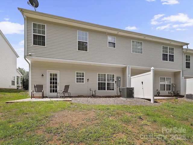 12415 Stratfield Place Cir, Pineville, NC 28134 - back of property featuring a patio area and a lawn