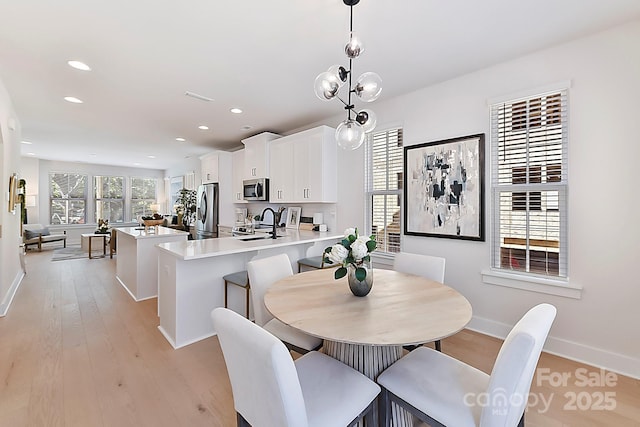 1223 E 16th St Unit 13, Charlotte, NC 28205 - dining area featuring light wood-style floors and recessed lighting
