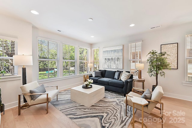 1223 E 16th St Unit 13, Charlotte, NC 28205 - living room featuring light wood-style flooring and recessed lighting