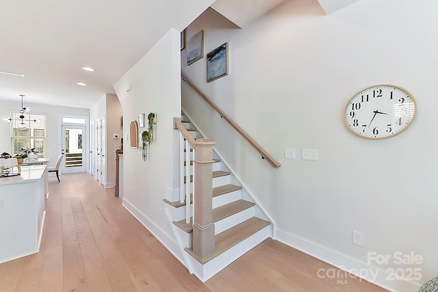 1223 E 16th St Unit 13, Charlotte, NC 28205 - stairs with wood finished floors and recessed lighting