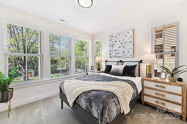 1223 E 16th St Unit 13, Charlotte, NC 28205 - carpeted bedroom featuring baseboards