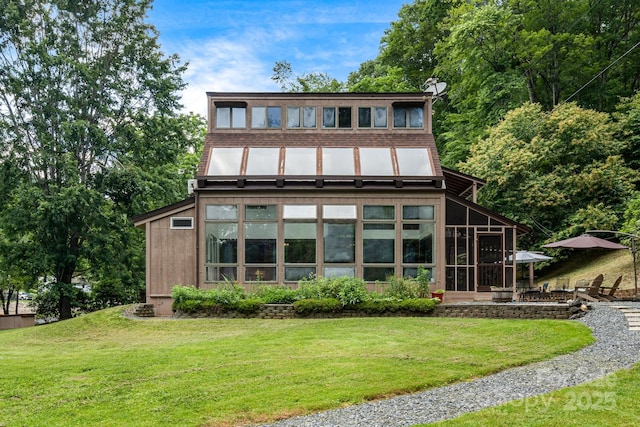 79 Creekside Ln, Spruce Pine, NC 28777 - back of property featuring a sunroom and a yard