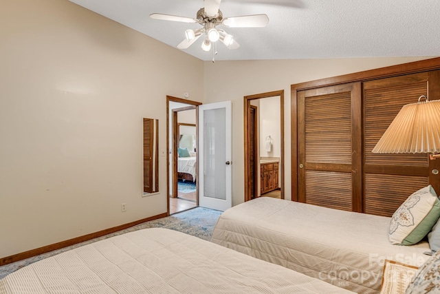 79 Creekside Ln, Spruce Pine, NC 28777 - bedroom with lofted ceiling, carpet flooring, a closet, ceiling fan, and connected bathroom