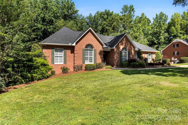 600 Queens Rd, Cherryville, NC 28021 - single story home with a front lawn, brick siding, and a shingled roof