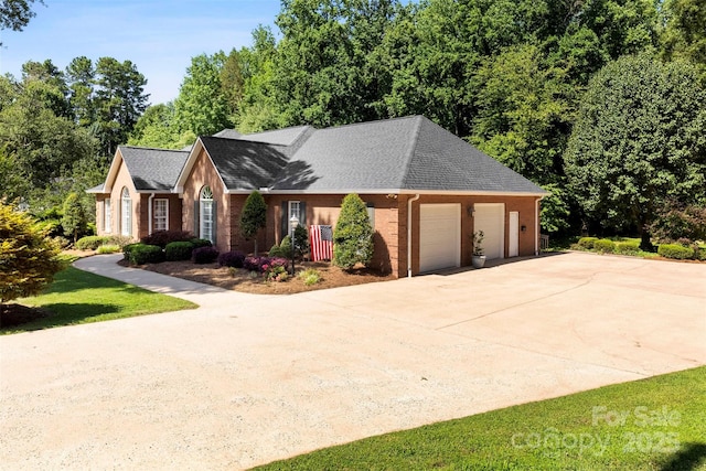 600 Queens Rd, Cherryville, NC 28021 - ranch-style house with a garage, concrete driveway, brick siding, and roof with shingles