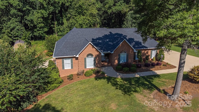 600 Queens Rd, Cherryville, NC 28021 - view of front facade with a front lawn, roof with shingles, and concrete driveway