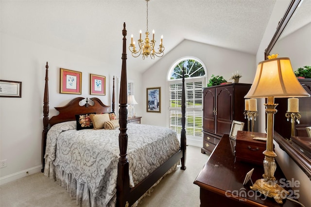 600 Queens Rd, Cherryville, NC 28021 - bedroom featuring a chandelier, light carpet, and vaulted ceiling