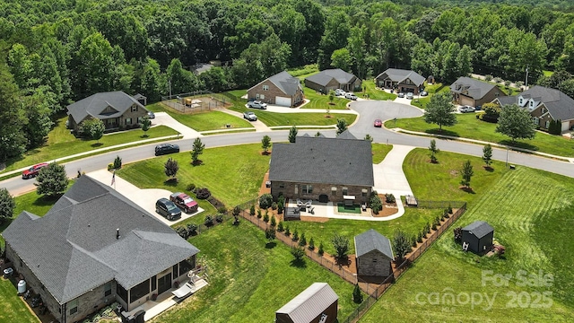 3256 Fairmead Dr, Concord, NC 28025 - aerial perspective of suburban area with a forest