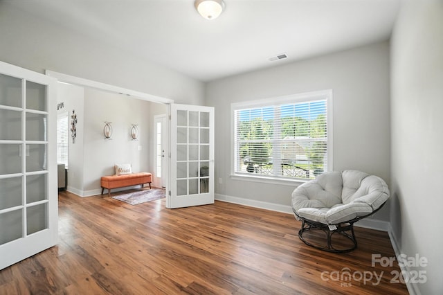 3256 Fairmead Dr, Concord, NC 28025 - sitting room featuring french doors and wood finished floors