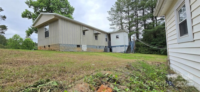 3682 Old Petra Mill Rd, Granite Falls, NC 28630 - view of property exterior with crawl space and a yard
