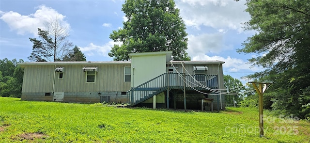 3682 Old Petra Mill Rd, Granite Falls, NC 28630 - rear view of house with stairs, a lawn, and crawl space