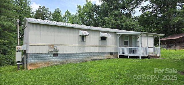 3682 Old Petra Mill Rd, Granite Falls, NC 28630 - view of property exterior featuring crawl space, a lawn, covered porch, and a metal roof