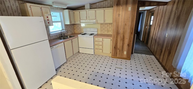 3682 Old Petra Mill Rd, Granite Falls, NC 28630 - kitchen with white appliances, under cabinet range hood, light flooring, and cream cabinetry