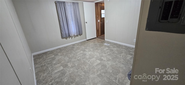 3682 Old Petra Mill Rd, Granite Falls, NC 28630 - spare room with electric panel and tile patterned floors