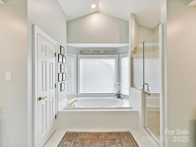19205 Hidden Cove Ln, Cornelius, NC 28031 - full bathroom featuring a shower stall, a tub with jets, and vaulted ceiling