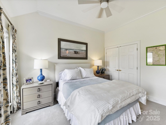 19205 Hidden Cove Ln, Cornelius, NC 28031 - bedroom featuring carpet flooring, a closet, ceiling fan, vaulted ceiling, and ornamental molding