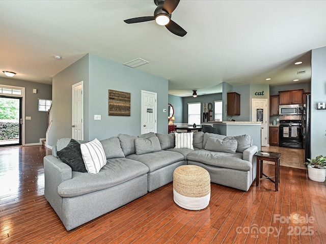 3009 Canopy Dr, Indian Trail, NC 28079 - living room with ceiling fan, dark wood-style flooring, and healthy amount of natural light