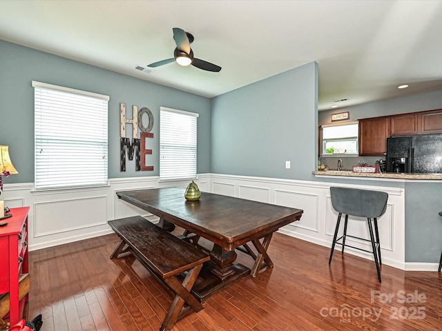 3009 Canopy Dr, Indian Trail, NC 28079 - dining room featuring a wainscoted wall, ceiling fan, dark wood-style flooring, a decorative wall, and recessed lighting