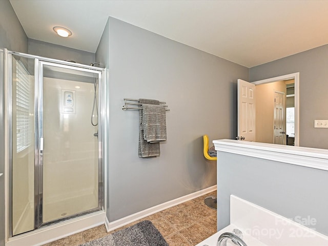 3009 Canopy Dr, Indian Trail, NC 28079 - bathroom with a stall shower and tile patterned flooring