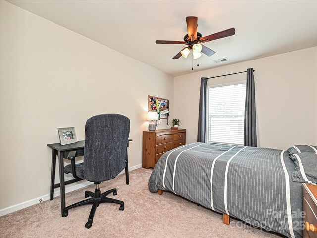 3009 Canopy Dr, Indian Trail, NC 28079 - bedroom with light colored carpet, a desk, and ceiling fan