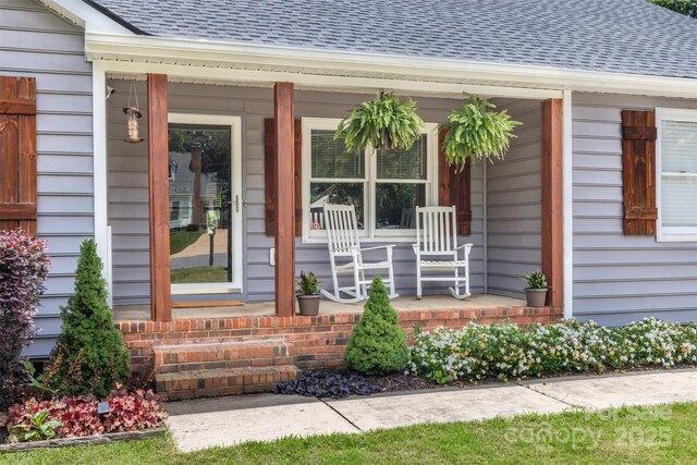 1507 Breckenwood Dr, Rock Hill, SC 29732 - doorway to property featuring a porch and a shingled roof